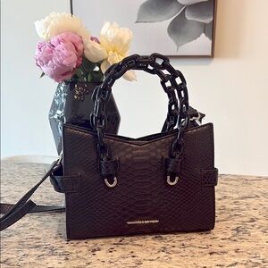 Manière de voir black handbag